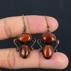 Use 70FORYOU Coupon Code For Get 70% Off On All Items Red Carnelian Earrings, Electroformed Earrings, Copper Wire Wrapped Earrings, Natural Gemstone Earrings, Handmade Jewelry, Dangle Earrings, Gift For Mother & Love. Gemstone : Red Carnelian  Earrings length : 4.6 Cm Metal : Copper  * Protection:- Copper will be tarnished after a while so try to limit contact with lotions, soaps or anything moist and never wear it in the shower, swimming or anywhere else it may come in contact with water. If tarnish becomes an issue, you may clean this item with jewelry cleaning cloth or ultra polishing pads. * Packing:- Your jewelry arrived in a beautiful gift box stored in bubble wrap for safe travel. * Rush your order: Please contact us to see if we can meet your deadline. You can also expedite your sh Electroformed Earrings, Carnelian Earrings, Mother Love, Red Carnelian, Soldering Jewelry, Wrapped Earrings, Earring Handmade, Earring Gift, Wire Wrapped Earrings