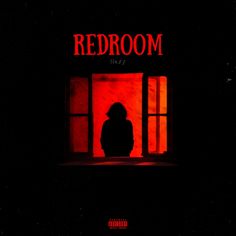 a person standing in front of a window with the word red room on it's side