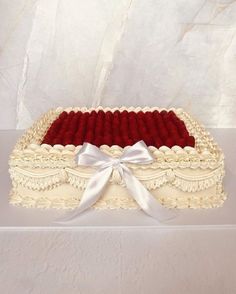 a white cake with red velvet on top