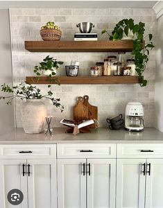 the kitchen counter is clean and ready to be used as a shelf for cooking utensils