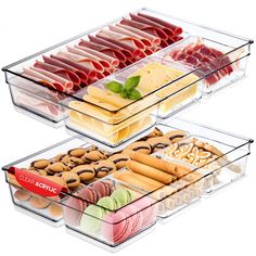 three trays filled with different types of food