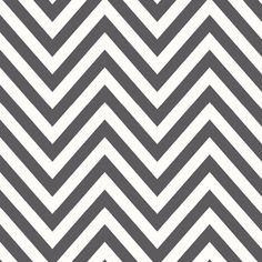 an abstract chevroned pattern in grey and white