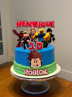 a birthday cake with cartoon characters on it