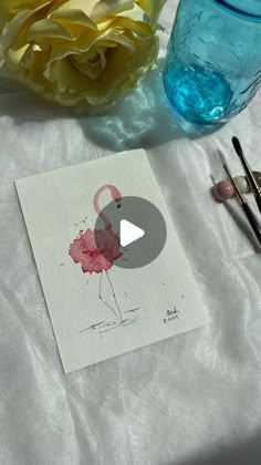 a watercolor painting of a pink flamingo on white paper next to two blue vases