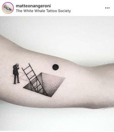 a man standing on top of a ladder next to a black and white tattoo design