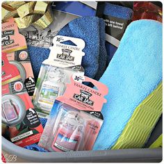 a basket filled with personal care products and items to use in a car washroom