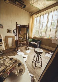 an old room with lots of clutter on the floor