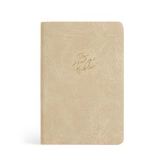 a white notebook with gold lettering on the front and back cover that says, i love you