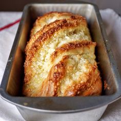 four pieces of bread in a metal pan