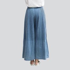 Introducing the 2023 Spring-Summer Collection the Pleated Culottes Women's Denim Pants Y2K Style. the perfect combination of timeless and vogue trend. Crafted from high-quality denim fabric. these jeans offer a flattering high-waisted fit with a rubber closure and light wash finish. With a unique year-2000 design. these divided-skirt are a testament to vogue fashion and classic charm.Why These Jeans Should Be Your Next Purchase Modern Y2K Design: Featuring a unique y2k design. these jeans are th