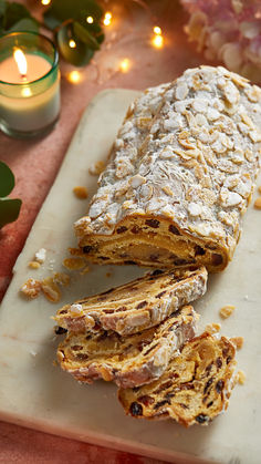 Christmas stollen with slices cut out on a marble board Mary Berry Stollen, Christmas Stollen Bread, Stollen Bites Recipe, Easy Stollen Recipe, Marzipan Pastry, Advent Recipes, Baking Website, Stollen Cake, Odd Fellow