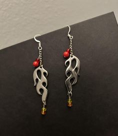 I was inspired to create these earrings from that one show with the clans of elemental wielders :)  This clan obviously being fire! Fire Jewelry Design, Fire Pendant, Fire Keychain, Fire Necklace, Fire Earrings, Outfit Sets, Jewelry Earrings Dangle, Etsy Earrings, Dangle Drop Earrings