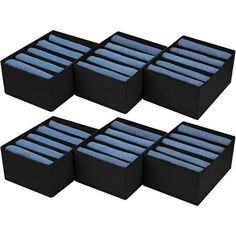 six black boxes with blue liners on them