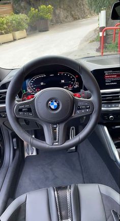 the interior of a car with dashboard and steering wheel