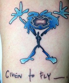 a tattoo with the words given to fly on it