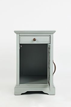 a small grey nightstand with an open drawer