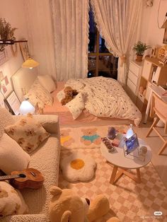 a teddy bear sitting on top of a bed in a room with white walls and curtains