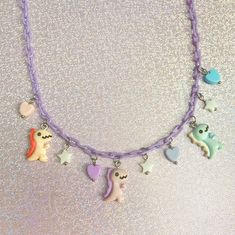 If you love wearing dinosaur themed items, then this pastel dinosaur necklace is the perfect addition to your aesthetic! Check out our necklace section for more unique designs that are truly OOAK❤️. *Choose from 3 different lengths: 16,18,20 inches (prices vary) If you have any questions, please don't hesitate to ask! We are friendly:) Visit our official website: www.yeetincolorboutique.com and follow us on Instagram: @yeetincolorboutique Dinosaur Jewelry, Cute Dinosaurs, Dinosaur Necklace, Pastel Kawaii, Kawaii Dinosaur, Kawaii Jewelry, Cute Pastel, Cute Dinosaur, Houston Tx