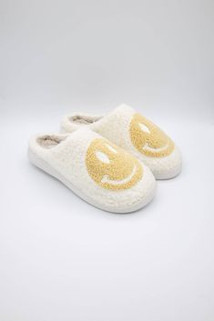 The perfect cozy shoe are these MIA Smiley Face Slippers for Women in Oatmeal/White! Super soft and cozy, these slippers feature a fuzzy lined interior, fun print on top uppers, and a memory foam footbed for extra comfort. Features: MIA Shoes Style: GS1412401-OATMEAL Color: Oat White Slippers Fuzzy lined Smiley face in oat white Memory foam footbed Rubber outsoles Slip on Hand wash warm, hang to dry Preppy Slippers, Smiley Face Slippers, Cozy Shoes, White Slippers, Mia Shoes, Slippers For Women, Oatmeal Color, Fun Prints, Smiley Face