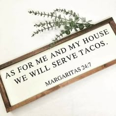 a sign that says as for me and my house we will serve tacos