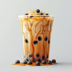 an iced drink with blueberries and caramel drizzled on the side