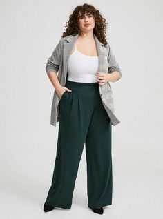 FIT Model is 5'9” wearing size 1. . Measures 30” inseam (size 2). . MATERIALS + CARE Brushed Twill woven fabric. . 63% polyester, 33% spandex, 4% spandex. Machine wash cold. Dry low. Imported. DETAILS Wide leg. . High rise. . Functional front and back pockets. . The best plus size women's brushed twill wide leg pants in darkest spruce made of brushedtwill. Rock your look from Torrid to Festivals like Coachella and Lollapalooza, a concert, a show, or just for fun! Torrid is your destination for cozy fall and winter clothes to keep you warm and comfortable. New Street Style, Pants Details, Winter Clothes, Bottom Clothes, Cozy Fall, Outerwear Jackets, Leg Pants, Wide Leg Pants, Woven Fabric