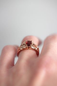 ✵ Learn more about us: www.edengardenjewelry.com ✵ WhatsApp number for urgent questions: +34 690 701 654 E-mail: edengardenshop@gmail.com This unique engagement ring is made from solid 14K rose gold and adorned with teardrop natural garnet. Pear cut garnet ring features botanical design with detailed leaves and romantic mood with touch of vintage inspired style. Matching wedding band is available: https://www.etsy.com/listing/737508284/nature-inspired-wedding-band-diamond Rose gold nature ring c Nature Wedding Band, Leaves Ring, Gold Leaf Rings, Garnet Engagement Ring, Natural Opal Ring, Leaf Engagement Ring, Engagement Ring Rose Gold, Unique Engagement Ring