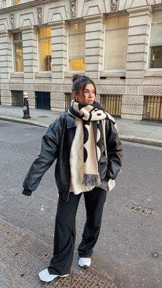 Cute black bomber, black pants and oversized scarf! This is a perfect winter outfit inspo for this seasons trends! Click the link to shop winter outfit inspo!🤍 #winteroutfit #outfits #fashion #winterfashion#brown #classy #chic #cute#cuteoutfit #cold #aesthetic #scarfstyle #style #ootd #winterstyle #casual #oldmoney London Outfit