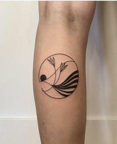 a tattoo on the leg of a person