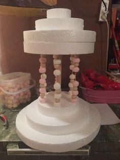 a large white cake sitting on top of a table