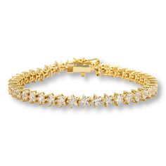 Radiance by Absolute™ Goldtone Magic Magnet Clasp Line Bracelet A jewelry icon, the line bracelet is a must-have for every wardrobe. The design's sleek, single-file stones deliver all-occasion accessorizing that flexes for every style. Absolute's simulated diamond version gives you even more to love about the look thanks to a magnetic clasp that makes the piece a breeze to put on.      Small approx. 6-3/4"L      Medium approx. 7-1/4"L     Large approx. 8"L     Approx. 3/16"W     Stamped .925 ste Jewelry Icon, Round Bracelet, Signature Jewelry, Star Bracelet, Wedding Watch, Magnetic Clasp, Star Shape, Bracelet Patterns, The Line