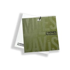 two business cards with the words wise and honey on them, both printed in green