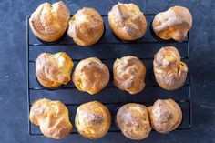 nine baked goods sitting on top of a cooling rack