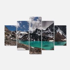 an image of a mountain lake with snow on the mountains and clouds in the sky