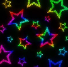 an image of colorful stars in the dark