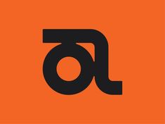 an orange and black logo with the letter j