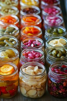 many jars filled with different types of food