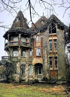 an old house with many windows and balconies