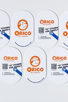 six orange and white stickers with the word orico printed on them are shown