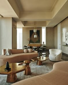 a living room filled with furniture and a piano