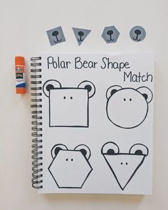 the polar bear shape match book is next to an orange marker and some other stickers