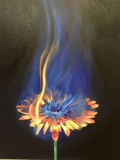 a painting of a flower with blue and yellow flames coming out of the center, on a black background