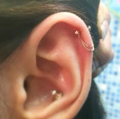 an ear piercing is seen in this image