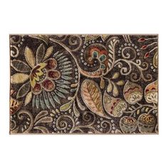 an intricately designed rug with flowers and leaves