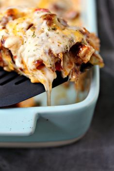 A slice of chicken enchilada casserole being lifted out of a baking dish. Chicken Enchilada Casserole Corn Tortillas, Enchilada Casserole Corn Tortillas, Layered Chicken Enchilada Casserole, Chicken Poblano, Tortilla Chicken, Mexican Favorites, Chicken Enchilada Casserole Recipe, Best Casserole Recipes, Best Casserole