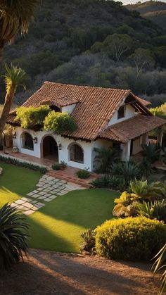 an aerial view of a house in the hills