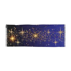 a blue blanket with gold stars on it