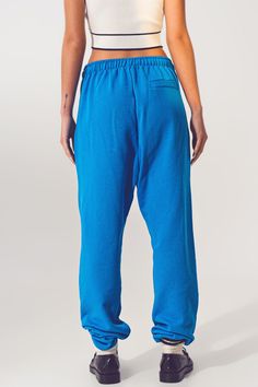 Subcategory: Pants. Fit: Jogger . Leg: Straight. Style: Comfy. Fabric: Sweatshirt fabric. Pockets: Side pockets . Zipper: Drawstring closure. Waist: Elasticated drawstring waist. runs true to size. U. 100% Cotton Blue Relaxed Cotton Sweatpants, Blue Straight Leg Leisure Pants, Relaxed Blue Pants For Lounging, Blue Cotton Sweatpants With Comfort Waistband, Blue Relaxed Fit Sweatpants With Ribbed Waistband, Relaxed Cotton Sweatpants For Lounging, Blue Straight Leg Bottoms For Leisure, Blue Straight Leg Leisure Bottoms, Casual Blue Bottoms For Leisure