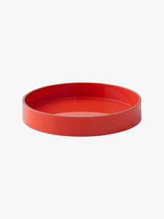 Circle tray with red lacquered finish.