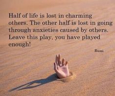 a person's hand reaching out from the sand in front of a quote that reads half of life is lost in charming others